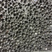 Spherical perforated aluminum foam material